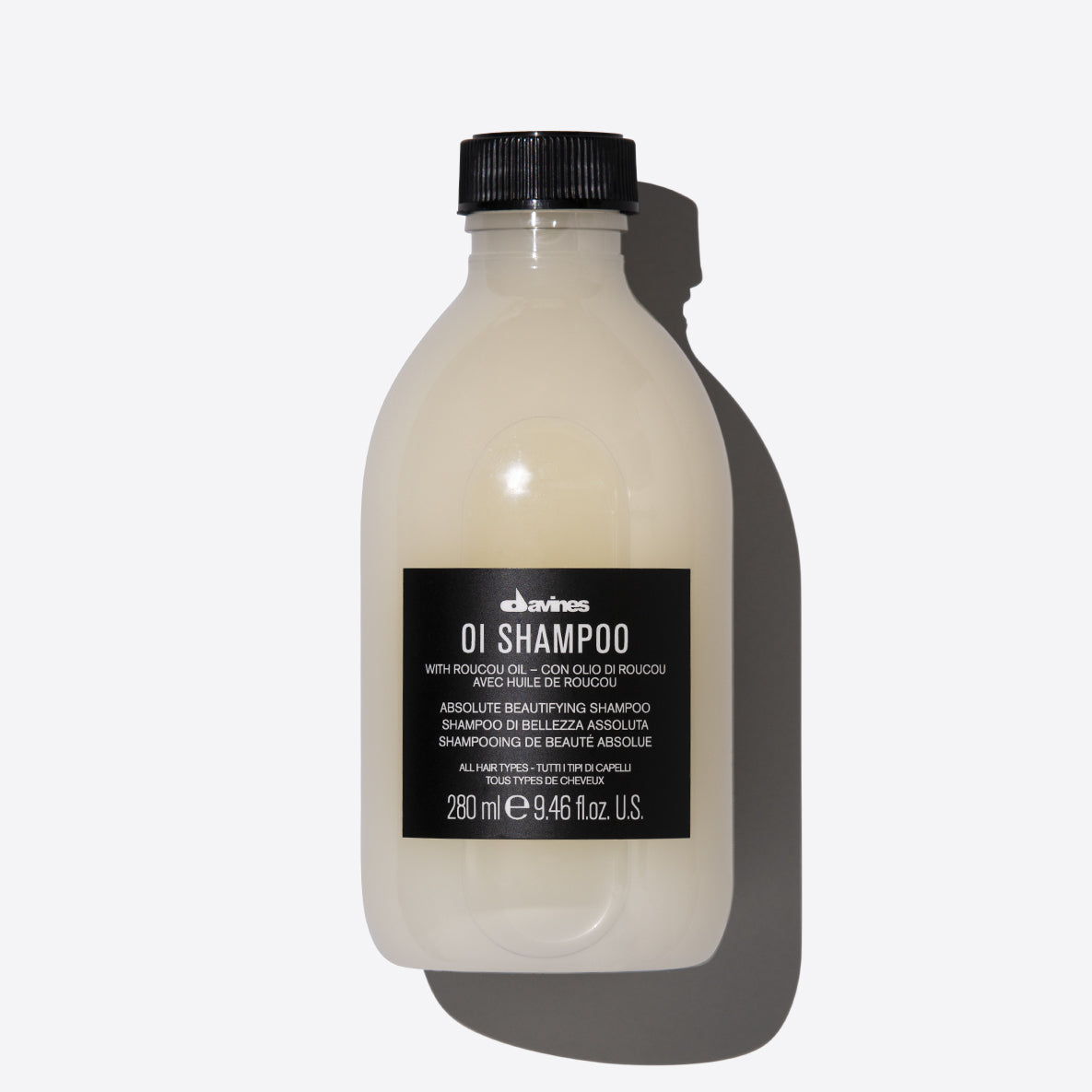 Oi Shampoo by Davines with Roucou oil, 280ml bottle, moisturizing hair care.