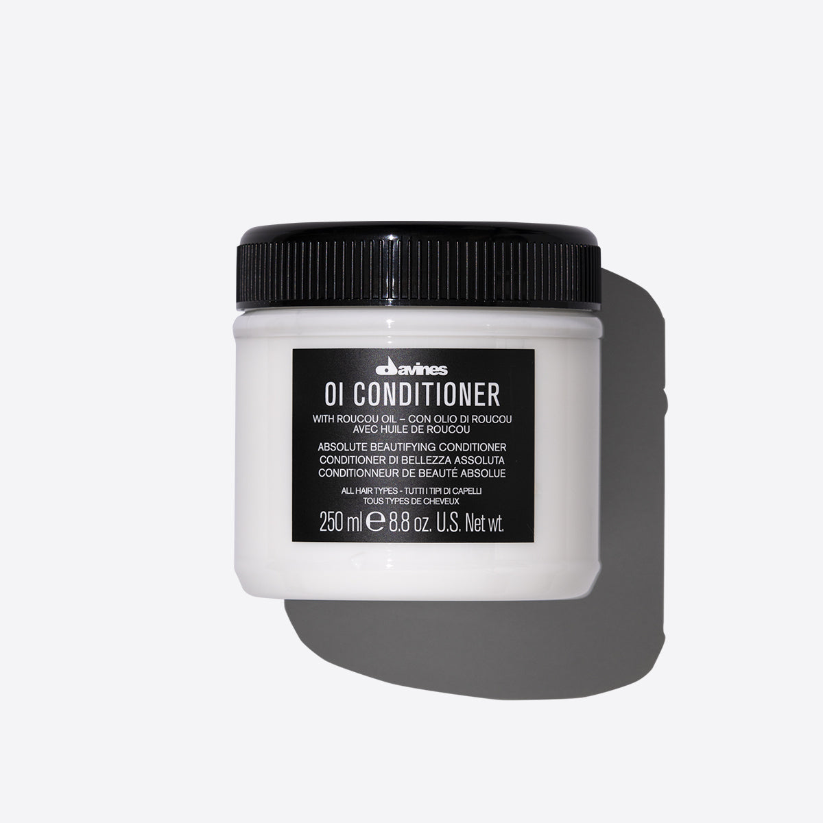 Oi Conditioner by Davines, 250ml jar, with Roucou oil for nourishing and moisturizing all hair types. Absolute beautifying conditioner for healthy, shiny hair.